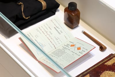Passport, smoking pipe and tobacco belonging to Sheikh Rashid bin Saeed Al Maktoum. Chris Whiteoak / The National