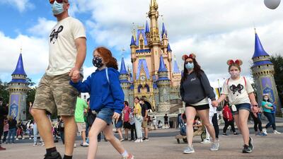 Masks will still be required for visitors aged 2 and over at all of the park’s indoor locations and attractions. AP
