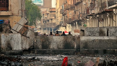 Security forces close Rasheed Street during ongoing anti-government protests in Baghdad. AP Photo