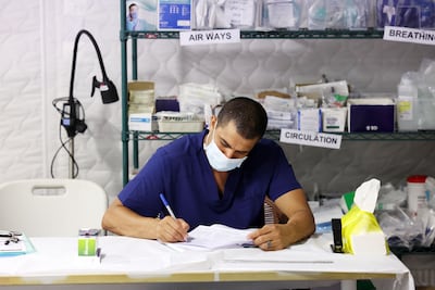 A doctor at the UAE's field hospital in Al Arish, Egypt. Chris Whiteoak / The National