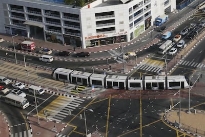 The Dubai Tram runs in a loop around Dubai Marina and Jumeirah Beach Residence, and connects to the main terminus in Al Sufouh. Sarah Dea / The National