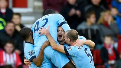 Manchester City's Frank Lampard celebrates with Pablo Zabaleta, Yaya Toure and Fernandinho after the Englishman scored his sides third goal against Southampton at St Mary's Stadium. Getty Images