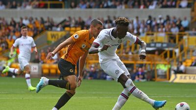 Chelsea's English striker Tammy Abraham shoots to complete his hat-trick. AFP
