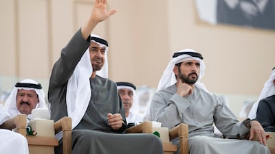 AL WATHBA, ABU DHABI, UNITED ARAB EMIRATES - December 04, 2025: HH Sheikh Mohamed bin Zayed Al Nahyan, President of the United Arab Emirates (L) and HH Sheikh Hamdan bin Mohamed Al Maktoum, Crown Prince of Dubai, UAE Deputy Prime Minister and Minister of Defence (R), attend the March of the Union, at the Sheikh Zayed Heritage Festival. ( Mohamed Al Hammadi / UAE Presidential Court ) ---
