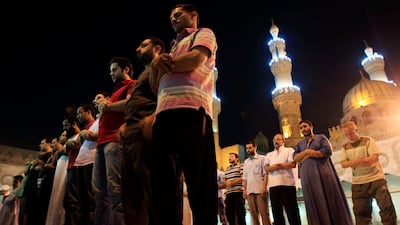 Cairo, Egypt. July 31, 2011. Muslim men attend the "Tarawih" evening prayer to mark the beginning of the holy month of Ramadan, at Al Azhar mosque in Cairo. REUTERS/Amr Abdallah Dalsh