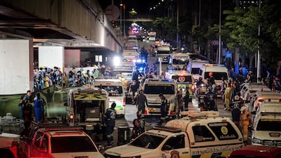 Police and ambulance staff arrive en masse. AFP