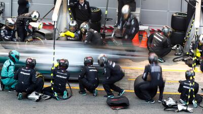 Mercedes' driver Lewis Hamilton makes a pit stop during a Formula One pre-season testing session at the Circuit de Barcelona-Catalunya, on Thursday, February 20. AP