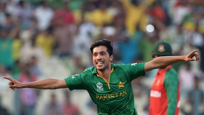 Pakistan's Mohammad Amir celebrates the dismissal of Bangladesh's Soumya Sarkar during their T20 World Cup clash at the Eden Gardens in Kolkata on March 16, 2016. AFP