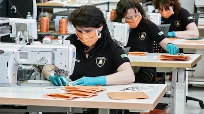 Lamborghini's staff members who normally work on the interiors will now work to produce 1,000 masks a day. Credit: Lamborghini