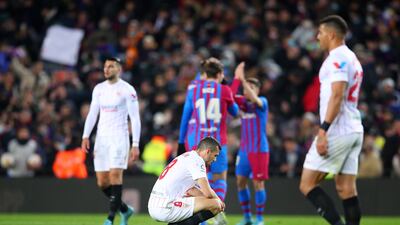 Sevilla's Joan Jordan cuts a dejected figure after Barcelona take the lead at Camp Nou. Getty