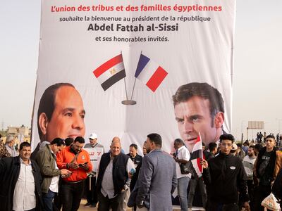 A banner welcoming Egyptian President Abdel Fattah El Sisi and his French counterpart Emmanuel Macron to Al Arish, Egypt. AP