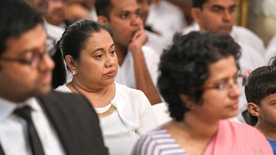 People attend the multi-religious observances at the Sri Lankan Embassy.
