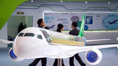 A model of COMAC's C919 is seen on display at the Airshow China 2014 in Zhuhai. Johannes Eisele / AFP
