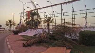 Date palms and debris lie strewn near Al Ain municipal ground after the storm.