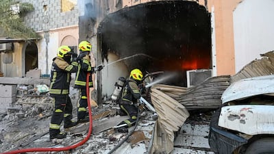 Bahraini firefighters battle a blaze sparked by Iranian attacks. Photo: Bahrain Interior Ministry