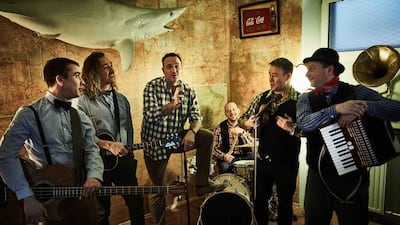 John Rech, third from left, with his indie-folk band, Dream Catcher. Courtesy Alliance Française Dubai