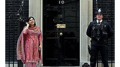 Baroness Warsi described her rise from a working-class childhood to government offices as "humbling".