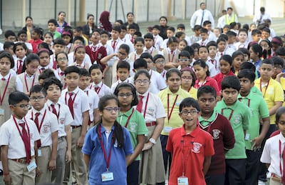 Pupils line up for assembly on the first day of school at Gems New Millennium School in Dubai. Pawan Singh / The National