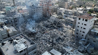 Buildings destroyed by Israeli air strikes on Bureij refugee camp in the Gaza Strip. AP
