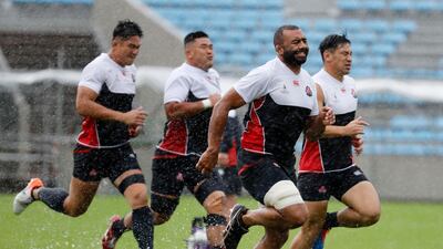 Japan players take part in a training session ahead of the crunch Pool A match against Scotland. AP Photo