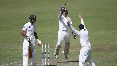 Saqlain Haider, centre, received rave reviews about his keeping and teamwork while in action for Australia in Sharjah on Friday. Francois Nel / Getty Images