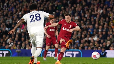 Liverpool's Diogo Jota scores their side's fifth goal. PA