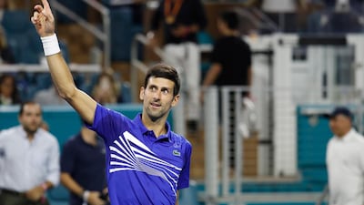 Novak Djokovic salutes the crowd after beating Bernard Tomic in the Miami Open second round. Reuters