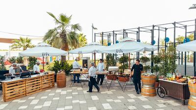 Food stations, including BBQ, at the Iris Yas Island Picnic Brunch. Courtesy of Iris