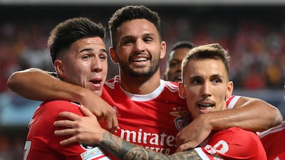 Benfica forward Goncalo Ramos (c) celebrates Danilo Pereira's own goal. AFP
