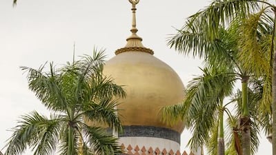 Tourists gather around the souvenir and gift shops at the front of a Mosque like building in Arab Town. Jonas Gratzer / LightRocket via Getty Images