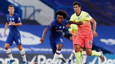 Chelsea's Willian brushed off the challenge of Rodri of Manchester City. Reuters