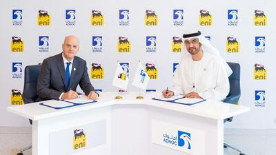 Dr Sultan Al Jaber, UAE Minister of State and Adnoc Group CEO, and Claudio Descalzi, CEO of Eni, sign a deal to award Eni a 25 per cent stake in the Ghasha sour gas concession. Courtesy Adnoc