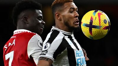 Newcastle midfielder Joelinton under pressure from Arsenal's Bukayo Saka. AFP