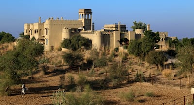 After leaving the city of Jodhpur and driving through rural terrain for about an hour, seeing Mihir Garh's fort exterior in the near distance brings instant calm. Photo: Mihir Garh