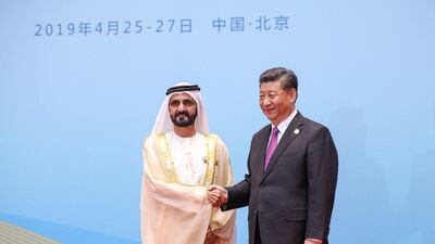 Sheikh Mohammed bin Rashid shakes hands with Chinese President Xi Jinping at the conclusion of the Belt and Road Initiative in Beijing. Photo HHShkMohd via Twitter