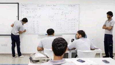 Students at IAT High School. Experts say making education compulsory is a very essential move.