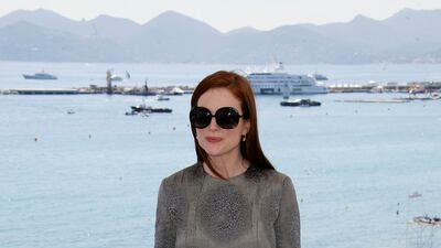 Julianne Moore, in Yves Saint Laurent, attends a photocall for 'Savage Grace' during the 60th annual Cannes Film Festival on May 18, 2007 in Cannes, France. Getty Images