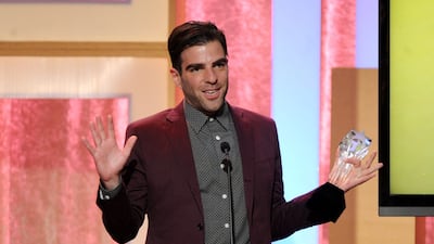 Zachary Quinto accepts his award for best supporting actor in a movie or mini-series for American Horror Story: Asylum. Frank Micelotta / Invision / AP