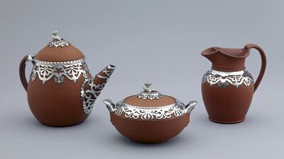 A red stoneware tea set made in England in the 1840s, when drinking tea became ubiquitous. Courtesy British Museum
