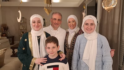 Hadil Lababidi, her husband Dr Ahmad Anjak and their three children at their home in West Chester, Ohio. Photo: Stephen Starr