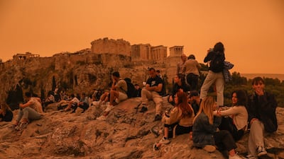 People gather around the Acropolis area. EPA