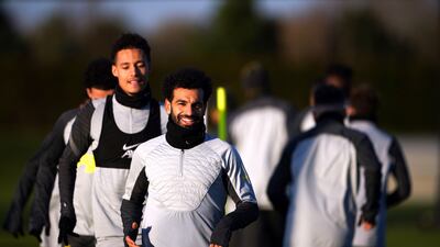Liverpool's Mohamed Salah exercises during a training session at the AXA Training Centre, Liverpool. AP