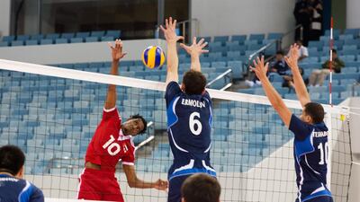The UAE, in red, opened their campaign at the 17th Asian Senior Men's Volleyball Championships with a 3-1 win over Uzbekistan. The tournament continues through October 6 at Hamdan bin Mohammed Stadium in Dubai. Duncan Chard for The National.