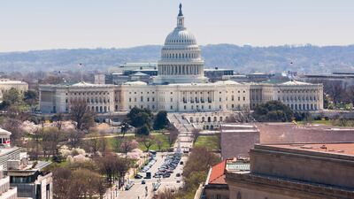 The Capitol building on Capitol Hill in Washington, as seen from the tower of the Old Post Office, which is now the Trump International Hotel. incamerastock / Alamy Stock Photo