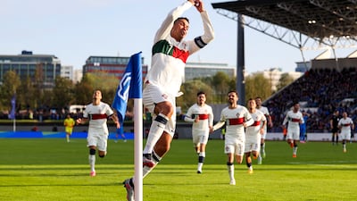 Cristiano Ronaldo celebrates in trademark fashion as his late winner saw off Iceland 1-0 in Euro 2024 qualifying. EPA