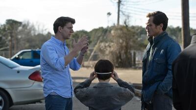 From left, writer-director Jeff Nichols, Jaeden Lieberher and Michael Shannon on the set of Midnight Special. Ben Rothstein / courtesy Warner Bros Entertainment