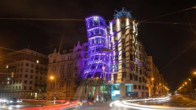 Purple lights illuminate the Frank Gehry-designed Dancing House to mark World Prematurity Day in Prague, Czech Republic. World Prematurity Day is observed annually on 17 November since 2011 to raise awareness of the consequences and health risks related to preterm child delivery. EPA
