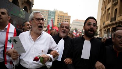 Lebanese lawyers shout slogans as they take part in anti-government protests in downtown Beirut in October 2019. Reuters