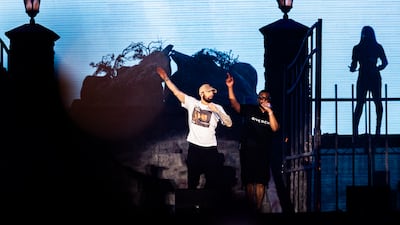 Eminem performs with sidekick Mr Porter
