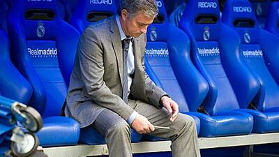 Mourinho won't say why but he says Real Madrid is the most difficult club in the world. Dominique Faget / AFP